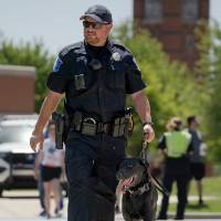 A GVPD officer with K9 unit dog.